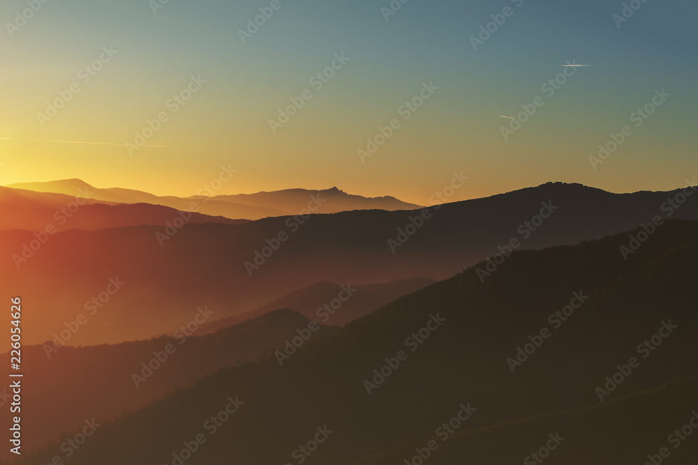 Lunigiana hills, north Tuscany, Italy. Beautiful sunset landscape.