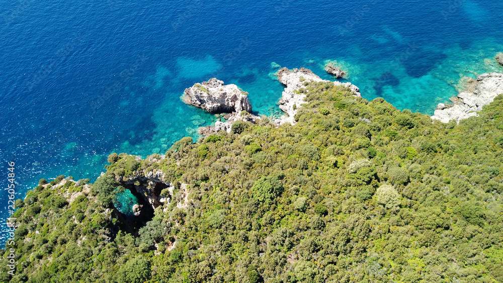 Obraz premium Aerial drone bird's eye view photo of iconic paradise sandy beaches with turquoise sea in complex islands of Agios Nikolaos and Mourtos in Sivota area, Ionian sea, Epirus, Greece