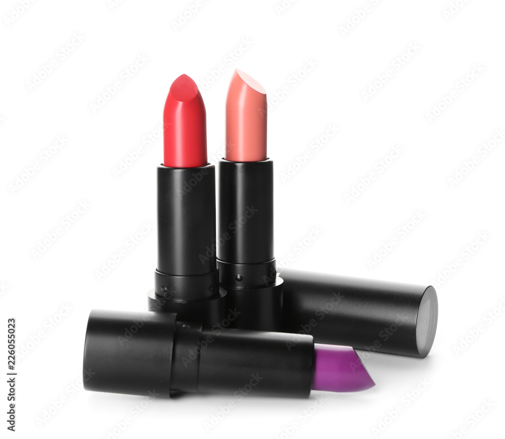 Fototapeta premium Colourful lipsticks on white background