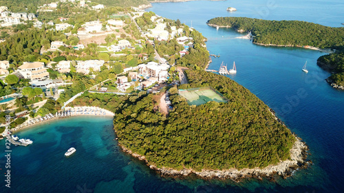 Aerial drone bird's eye view photo of iconic paradise sandy beaches with turquoise sea in complex islands of Agios Nikolaos and Mourtos in Sivota area, Ionian sea, Epirus, Greece © aerial-drone