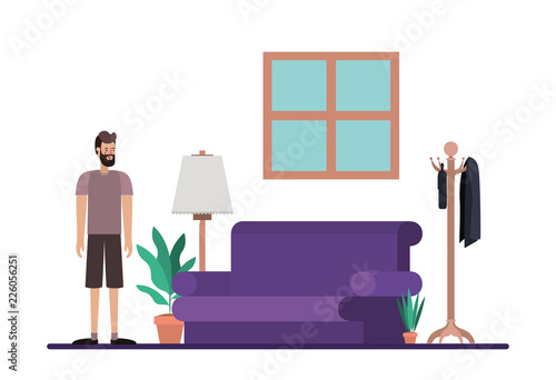 young man with beard on the livingroom