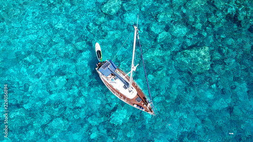 фотографія Aerial drone bird's eye view photo of sail boats docked in tropical caribbean pa