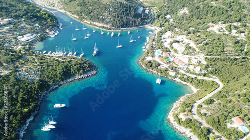 Принти на полотні Aerial drone top view photo of luxury sail boats docked in tropical bay with tur
