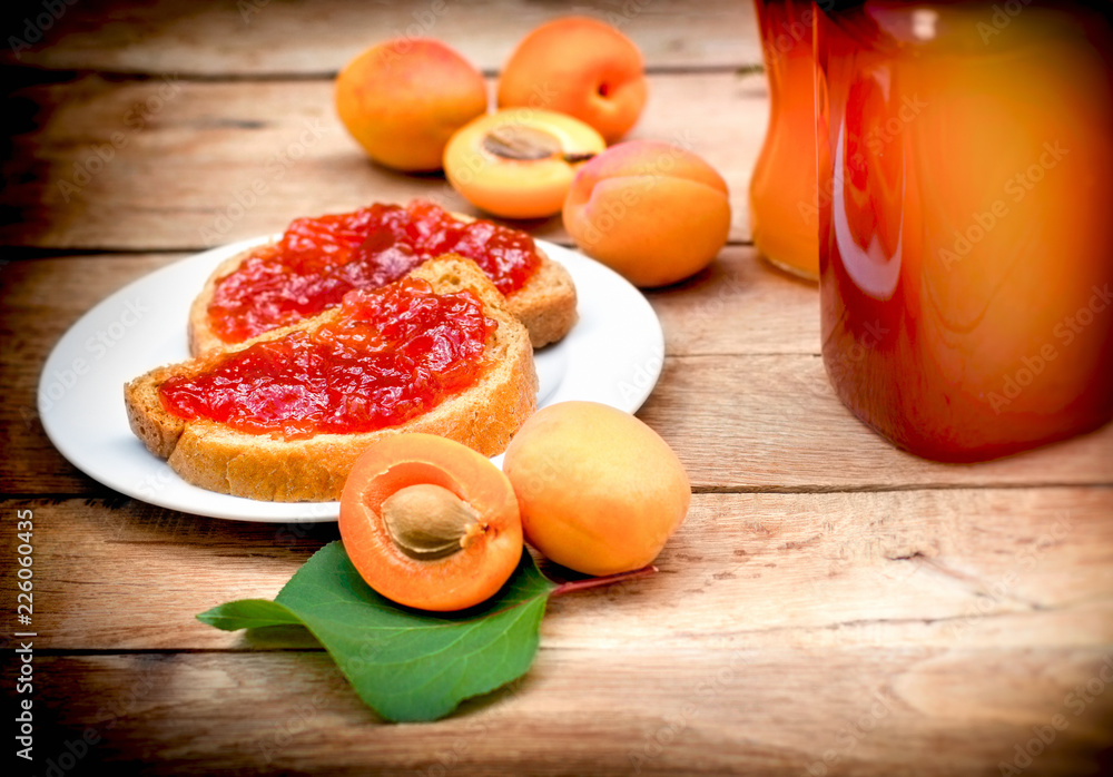 Apricot jam on bread, tasty meal (breakfast) Apricot jam on bread, tasty meal (breakfast)