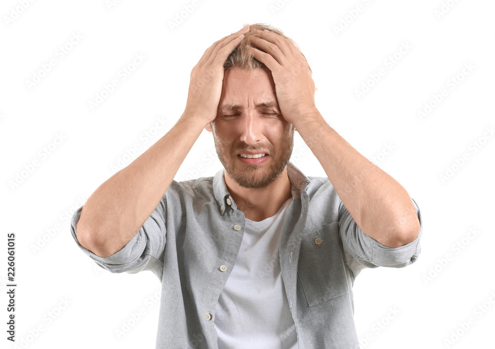 Naklejka premium Portrait of stressed man on white background