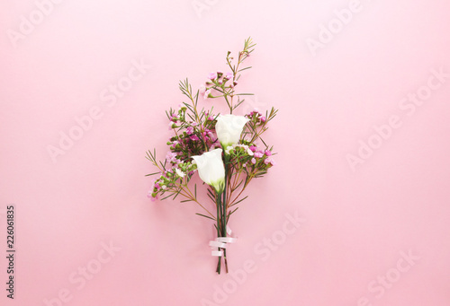 Spring bouquet on pink background