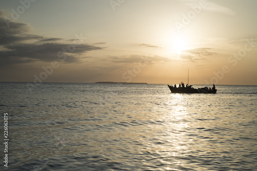 Zanzibar, a typical boat sailing at sunset  © ema