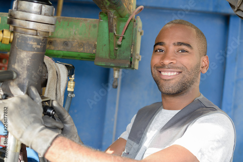 worker posing while cleaning photo