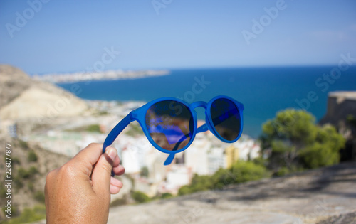 sunglasses, view of the sea in the city of Alicante, Spain