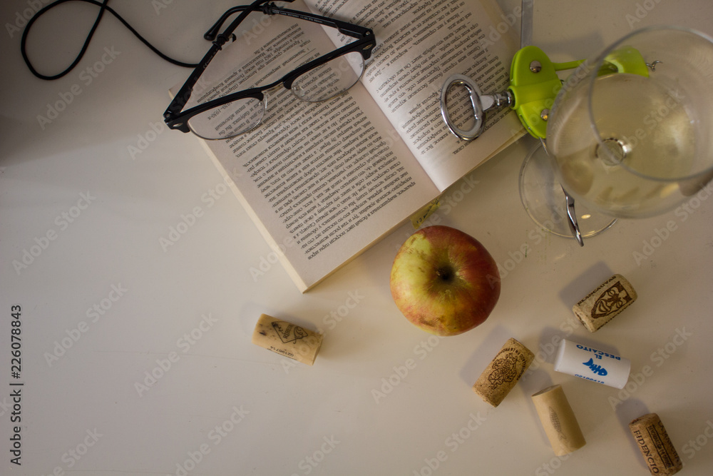 apple, the book, points, glass, wine, bracelets, traffic jams, corkscrew on a table