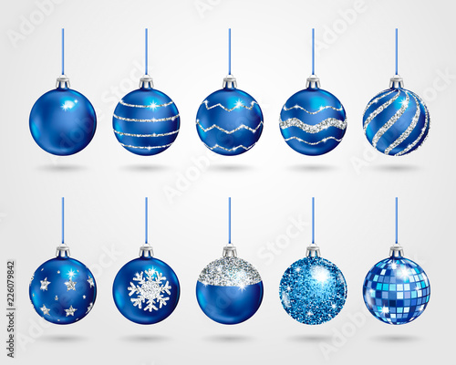 Set of realistic blue Christmas balls with different patterns of silver sequins. Vector illustration 