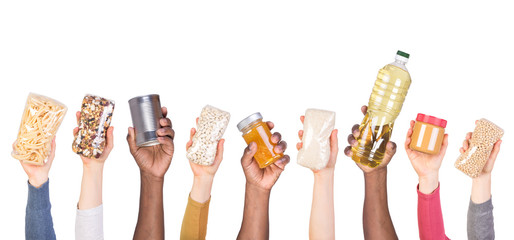 Food donations in hands isolated on white background
