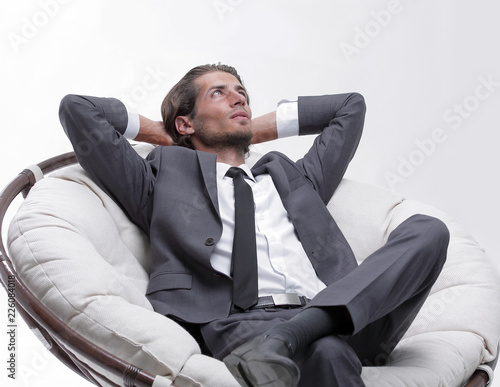 businessman resting in a comfortable chair