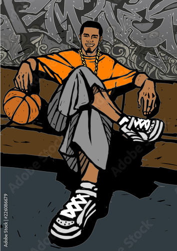 Man holding a basketball and sitting on a bench in front of a graffiti covered wall