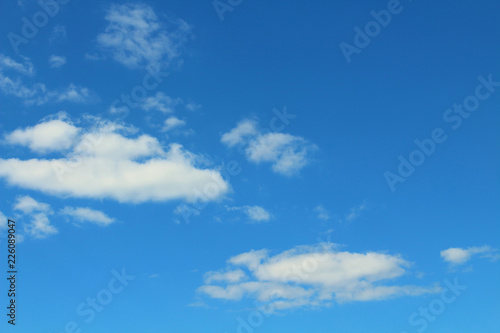 Beautiful blue sky and white cumulus clouds. Background. Landscape. © far700