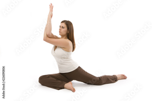 Healthy, attractive young woman practicing yoga pose