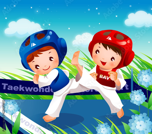 Two boys practicing Tae kwon do