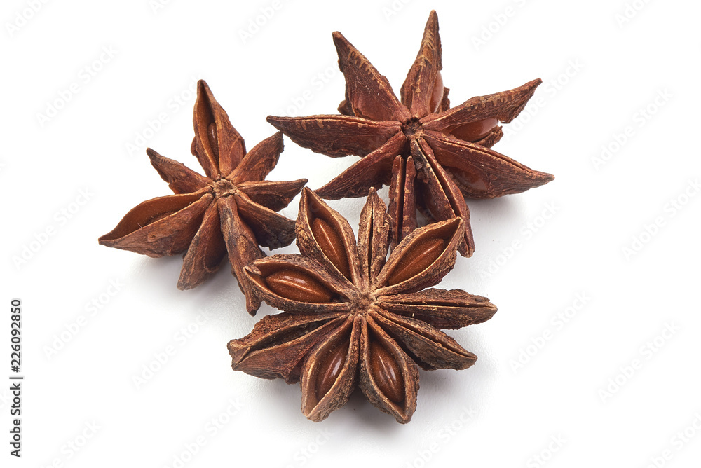 Anise star, badian spice, close-up, isolated on a white background.