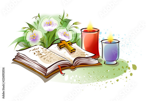Close-up of the Bible with burning candles