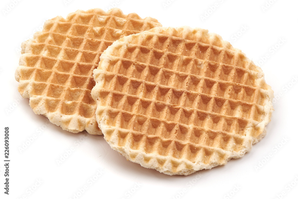 Round Belgium Waffles, close-up, isolated on white background. Round Belgium Waffles, close-up, isolated on white background.