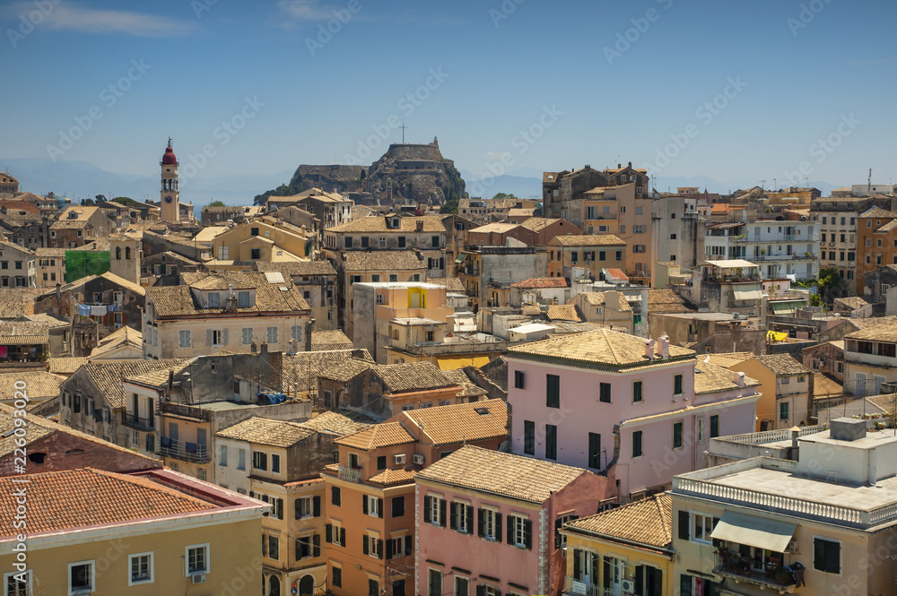 Panoramic view of the city of Corfu Kerkyra from above. Colorful city buildings in a soft shade of pastel fill the frame. The perfect place for a holiday.