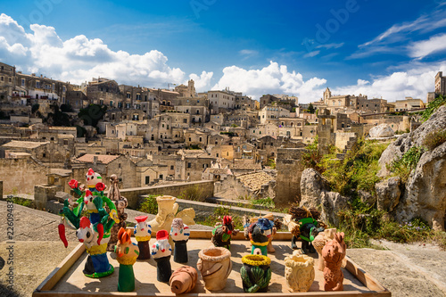 Typical Lucanian whistles and in the background the old city of Matera
