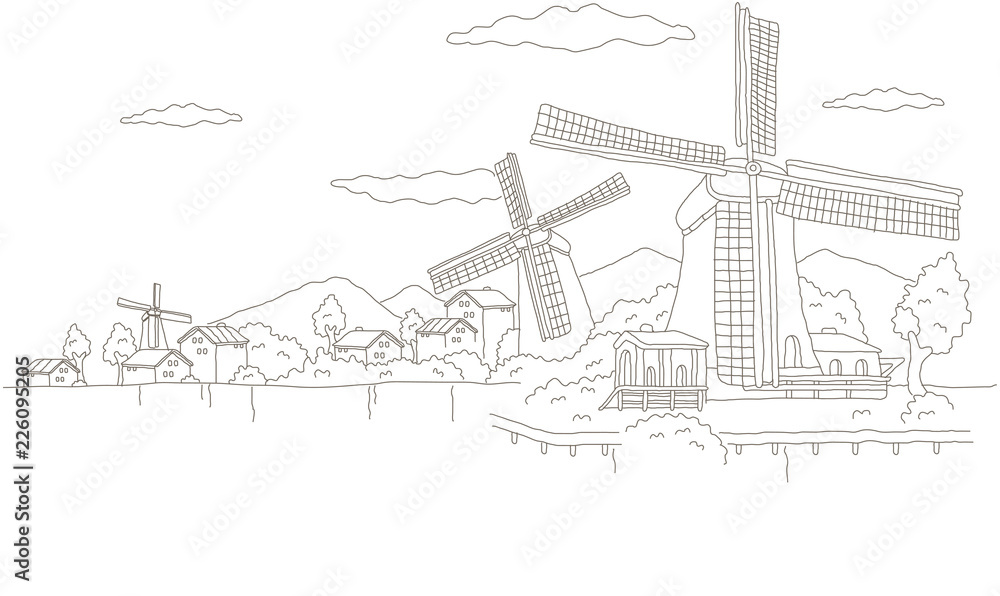 Traditional windmills along a river