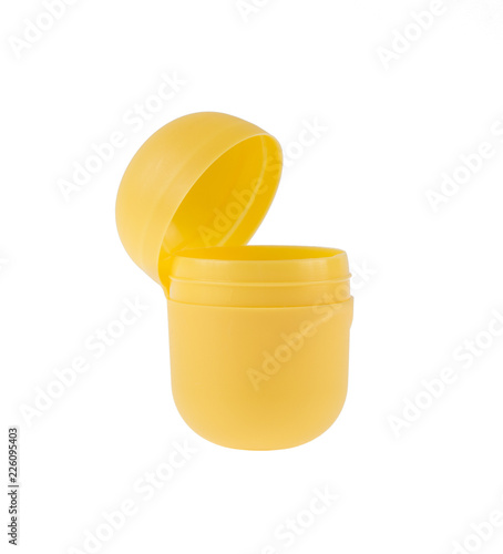 yellow capsule kinder surprise isolated on white background