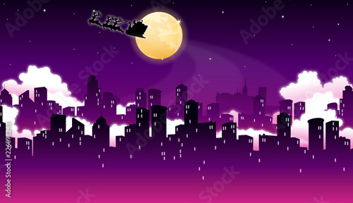 Silhouette of Santa Claus riding a sleigh over buildings