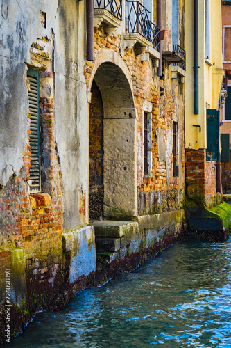Elements of architecture of houses on the streets of the canals of the city of Venice in Italy.