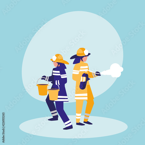 group of firefighters with buckets and extinguisher