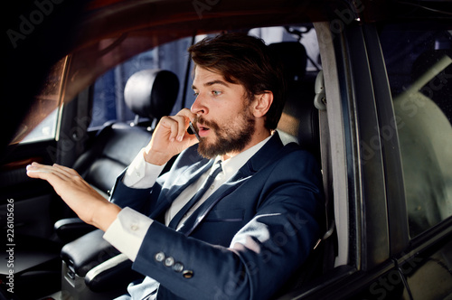 business man driving talking on the phone © SHOTPRIME STUDIO