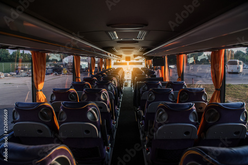 A row of empty seats in a bus
