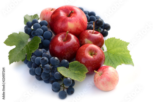 Wine grapes and red apples. Fruit composition on white background. Top view.