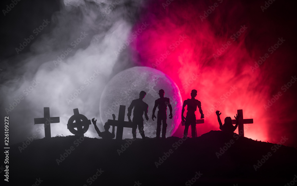Scary view of zombies at cemetery dead tree, moon, church and spooky cloudy sky with fog, Horror Halloween concept. Scary view of zombies at cemetery dead tree, moon, church and spooky cloudy sky with fog, Horror Halloween concept.