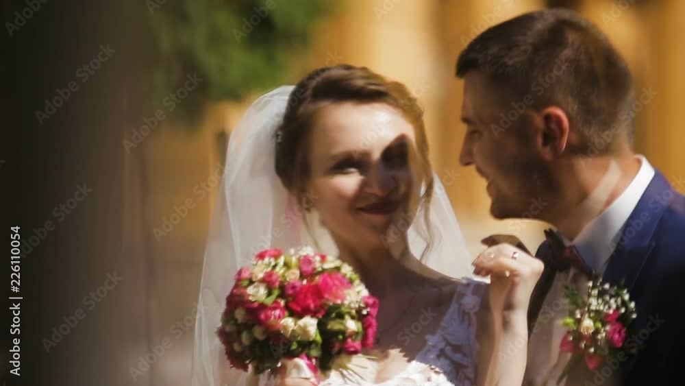 Beautiful couple walking in old historical town Beautiful couple walking in old historical town