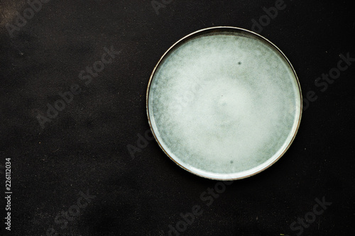 Ceramic plate on dark background