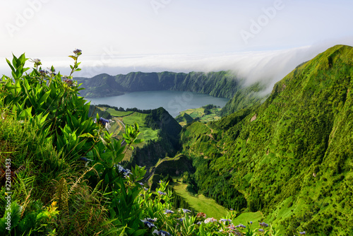 Panoramic landscape from Azores lagoons. The Azores archipelago has volcanic origin and the island of Sao Miguel has many lakes fand is the best travel destination of Portugal. photo