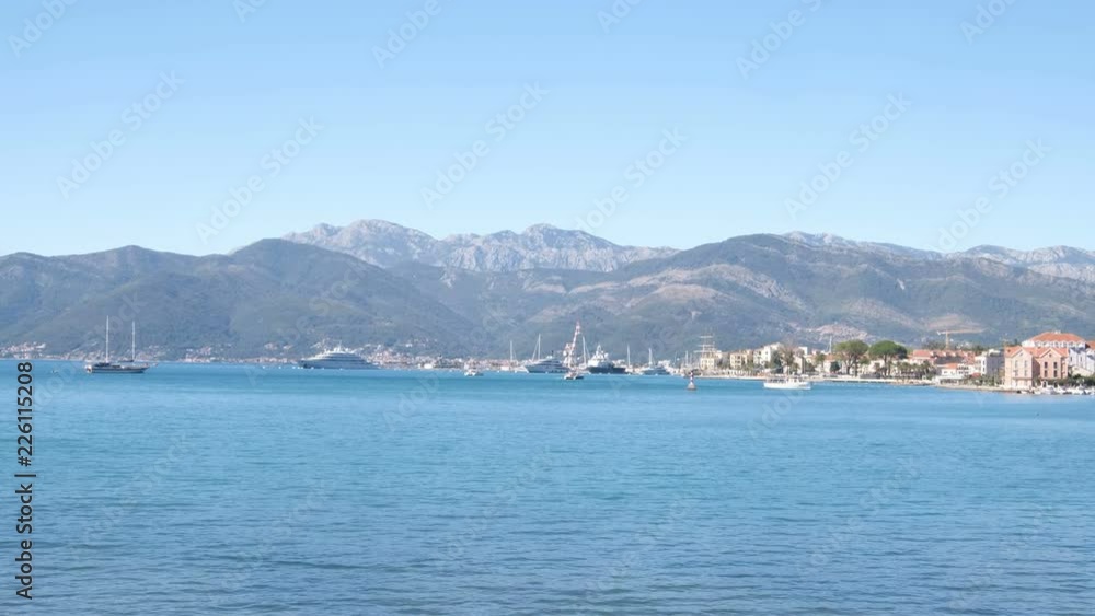 Boat in the Bay of Kotor. Montenegro, the water of the Adriatic Sea Boat in the Bay of Kotor. Montenegro, the water of the Adriatic Sea