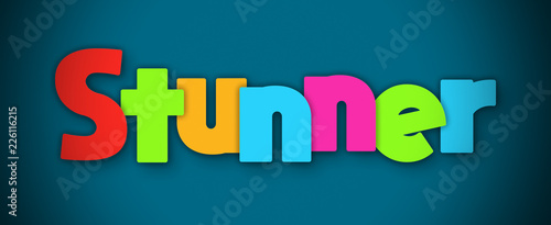 Fotografie Stunner - overlapping multicolor letters written on blue background
