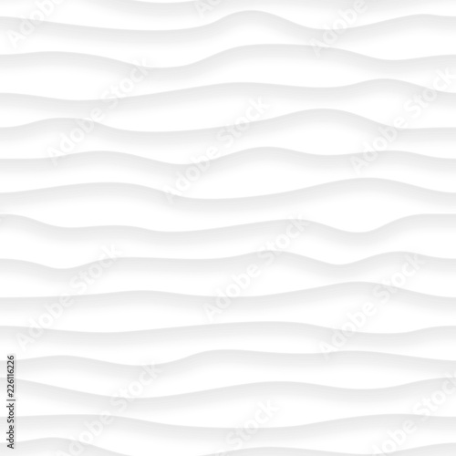 Abstract seamless pattern of wavy lines with shadows in white and gray colors