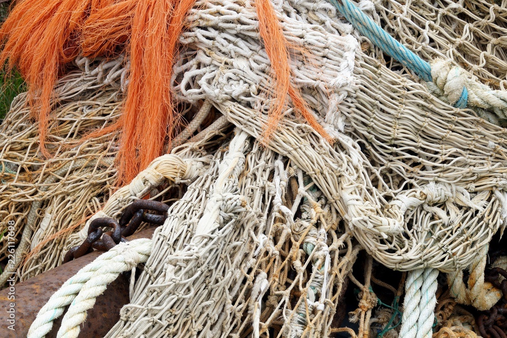 Fishing nets, rusty chains and ropes Fishing nets, rusty chains and ropes