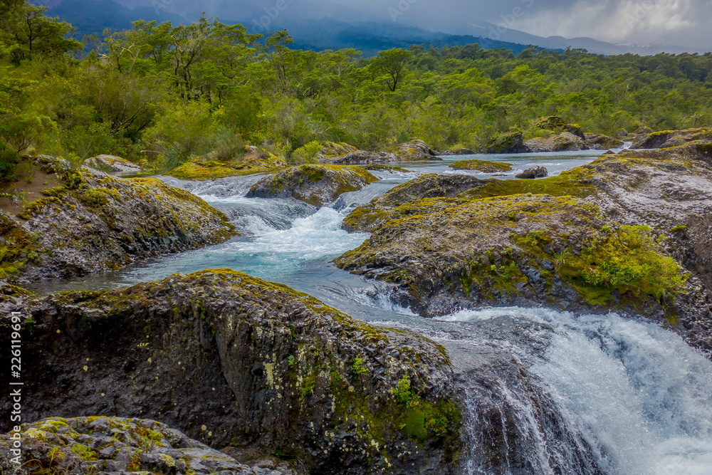 Saltos de Petrohue. Waterfalls in the south of Chile, formed by volcanic action Saltos de Petrohue. Waterfalls in the south of Chile, formed by volcanic action