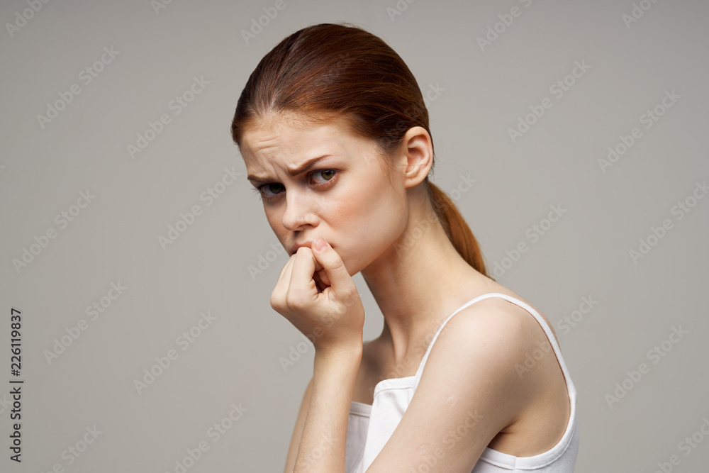 sad woman on light health background sad woman on light health background