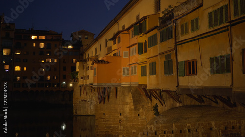 In focus view of Ponte Vecchio bridge in Florence, italy at night