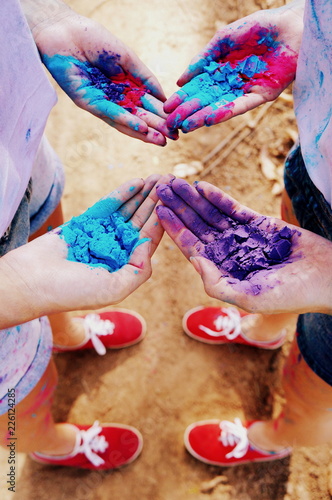 hands of girls with paint