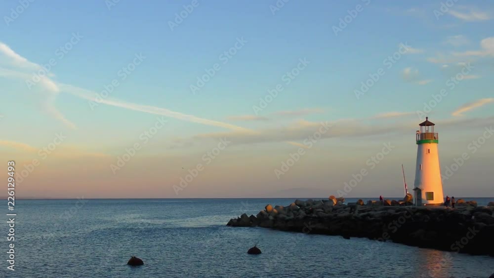 The Pacific Ocean at the Santa Cruz Breakwater (aka Walton) Lighthouse at sunset, in Santa Cruz, California, USA, circa April 2017 The Pacific Ocean at the Santa Cruz Breakwater (aka Walton) Lighthouse at sunset, in Santa Cruz, California, USA, circa April 2017
