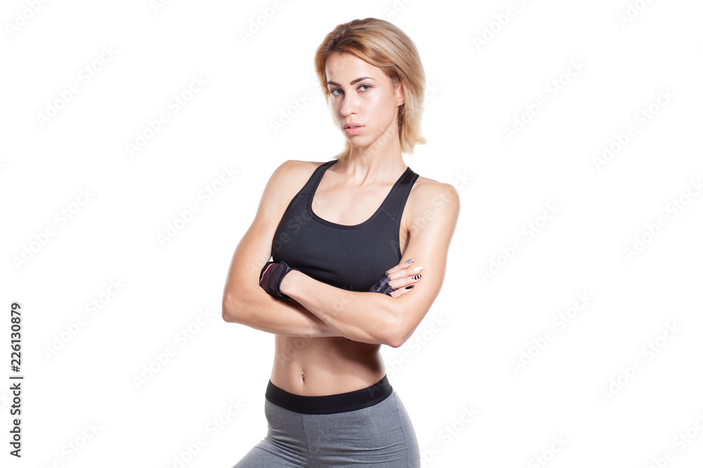 fitness woman in sportswear with cross hands isolated on white background fitness woman in sportswear with cross hands isolated on white background