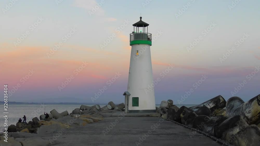 The Santa Cruz Breakwater (aka Walton) Lighthouse at sunset, in Santa Cruz, California, USA, circa April 2017 The Santa Cruz Breakwater (aka Walton) Lighthouse at sunset, in Santa Cruz, California, USA, circa April 2017