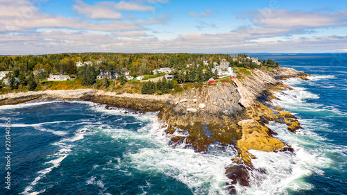 Aerial view of Pemaquid Point Light. The Pemaquid Point Light is a historic US lighthouse located in Bristol, Lincoln County, Maine, at the tip of the Pemaquid Neck.